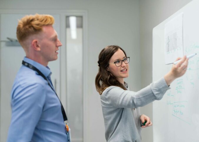 Female Engineer Holding Presentation